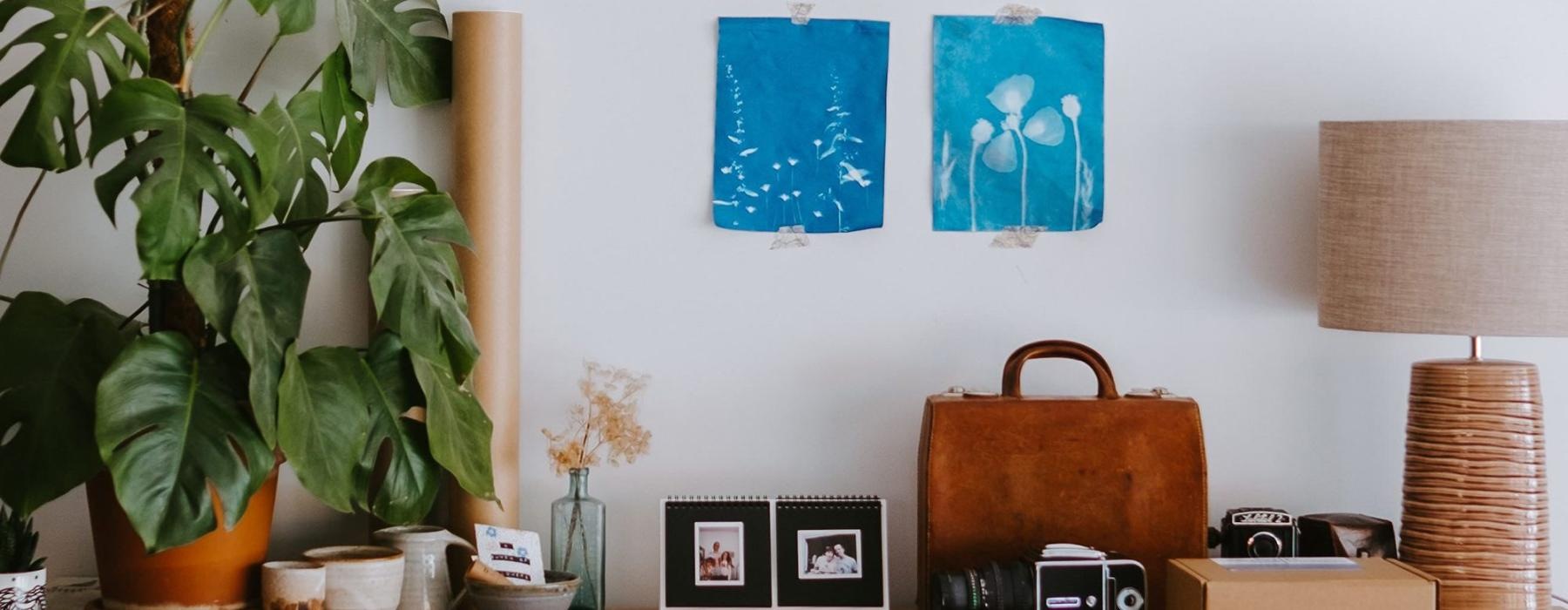 large dresser with a variety of decor on it