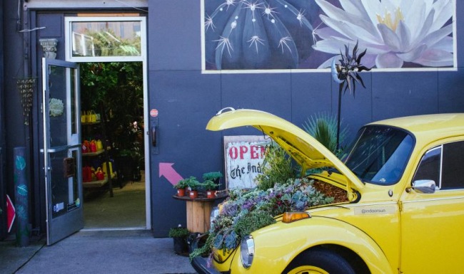 Find your perfect fit at Rowlock Seattle a yellow car with a sign on it